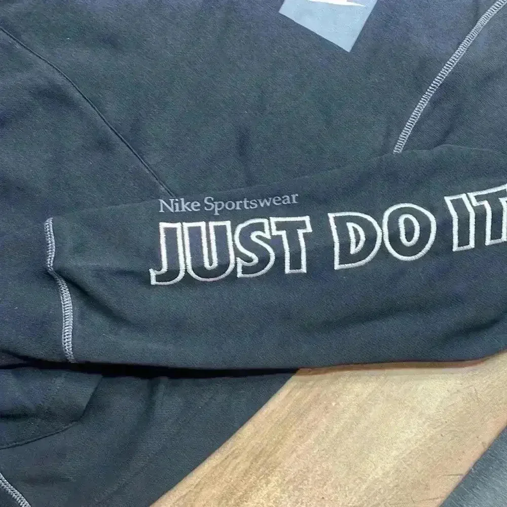 Nike hoodie, black with white lettering size Medium, perfect condition!
